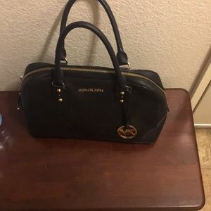 Black and gold Michael Kors bag
